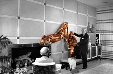 Now that’s a presentation! Combing thru some files while working on my certification course, I came across this photo of William “Billy” Haines making a drapery presentation to a client.  William “Billy” Haines was an American actor and interior designer. Known for his impeccable taste in interior design and love for vintage pieces, Haines worked closely many celebrities. His career was launched by his unconventional choice of an all-white decor for his friend, Joan Crawford’s living room. 
Haines’ signature style incorporated custom-made modern furnishings and period antiques with touches of Chinoiserie and exotic artifacts in a glamorous mix that would retrospectively become known as Hollywood Regency style. The centerpieces of Haines’ interiors were his custom designs including tufted sofas, iconic chairs –the Seniah, the Elbow, the Pull Up and the Hostess.  Haines hired talented local artists, craftsmen and workshops to produce his one of a kind custom pieces specially crafted per client.  #loveagoodpresentation #windowdressings #designicon #americanasethetic #hollywoodregency l